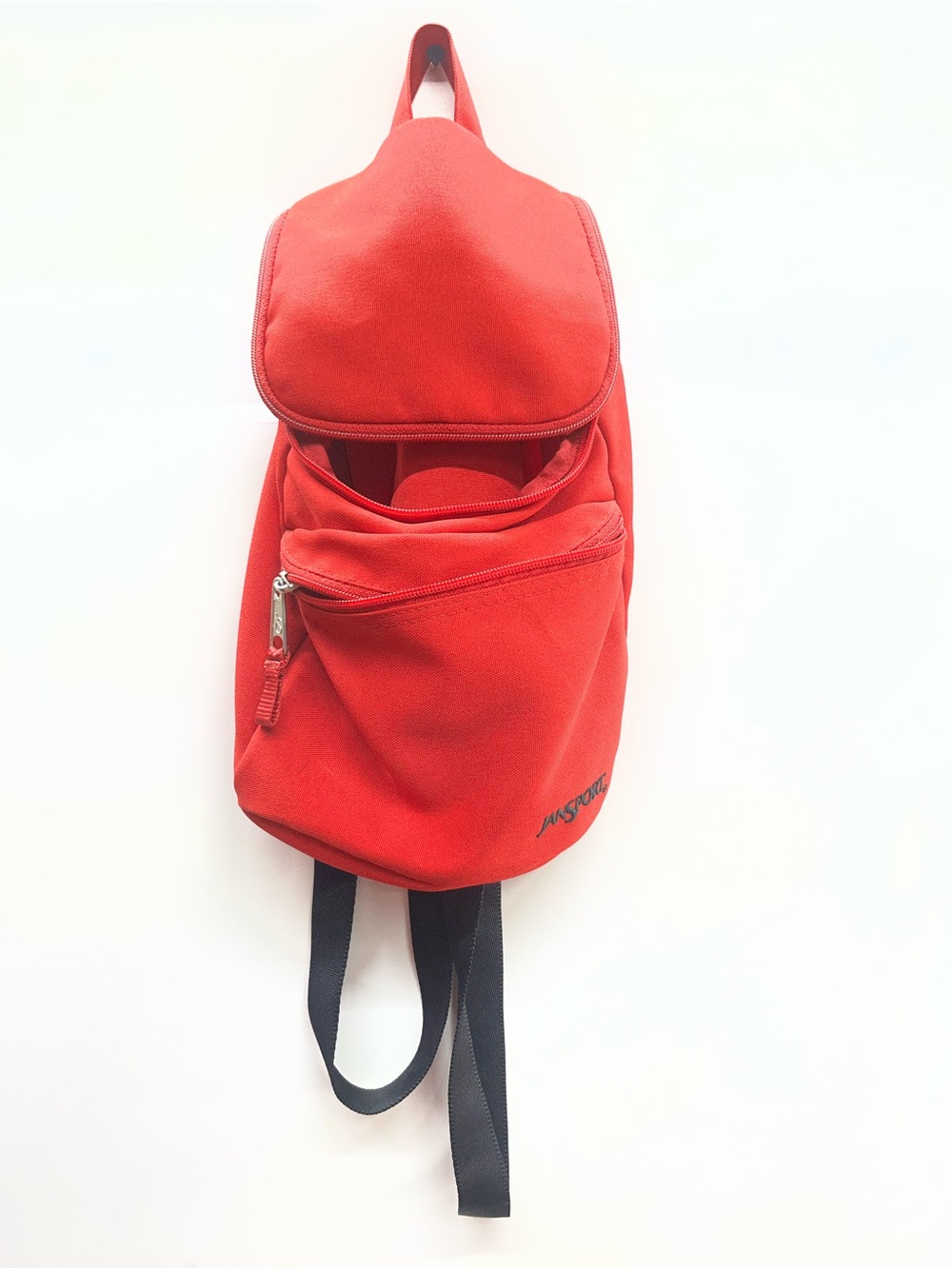 Jansport Red Sling Backpack with Front Zip Pocket